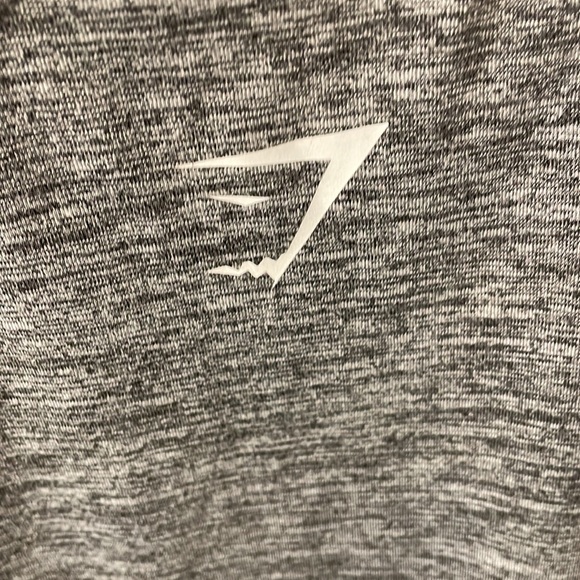 Gymshark cropped long sleeve workout top with cut our at elbow. Grey. Size M - Picture 6 of 9